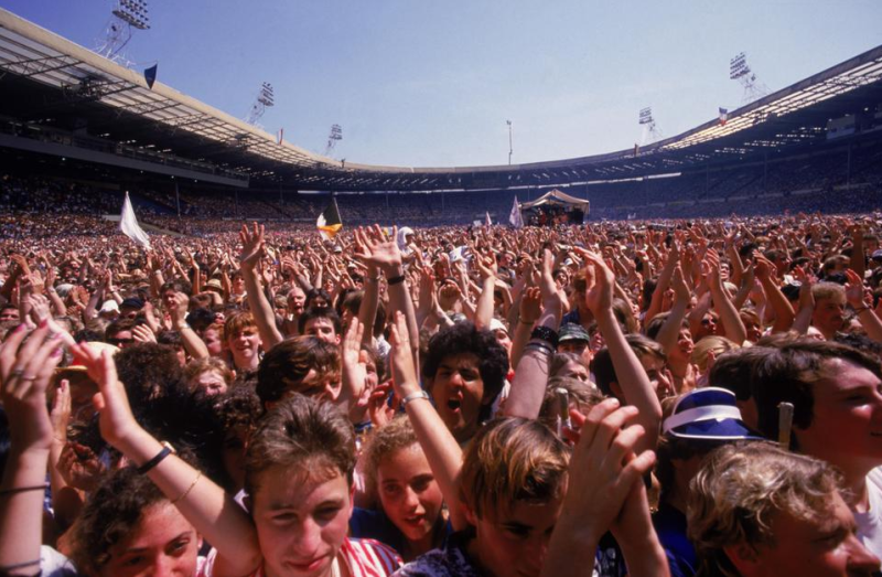 A view of the crowd at the Live Aid charity concert, Wembley Stadium, London, 13th July 1985. (Photo by Dave Hogan/Hulton Archive/Getty Images)